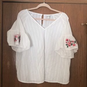 White and floral blouse